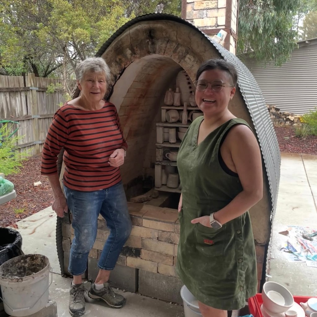Maryke and Kris loading the kiln