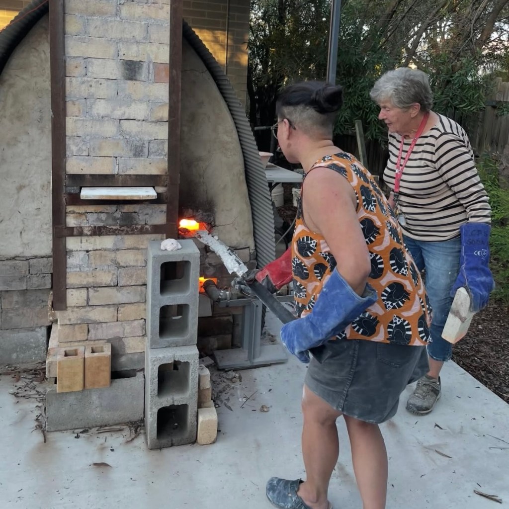 Maryke and Kris firing the kiln